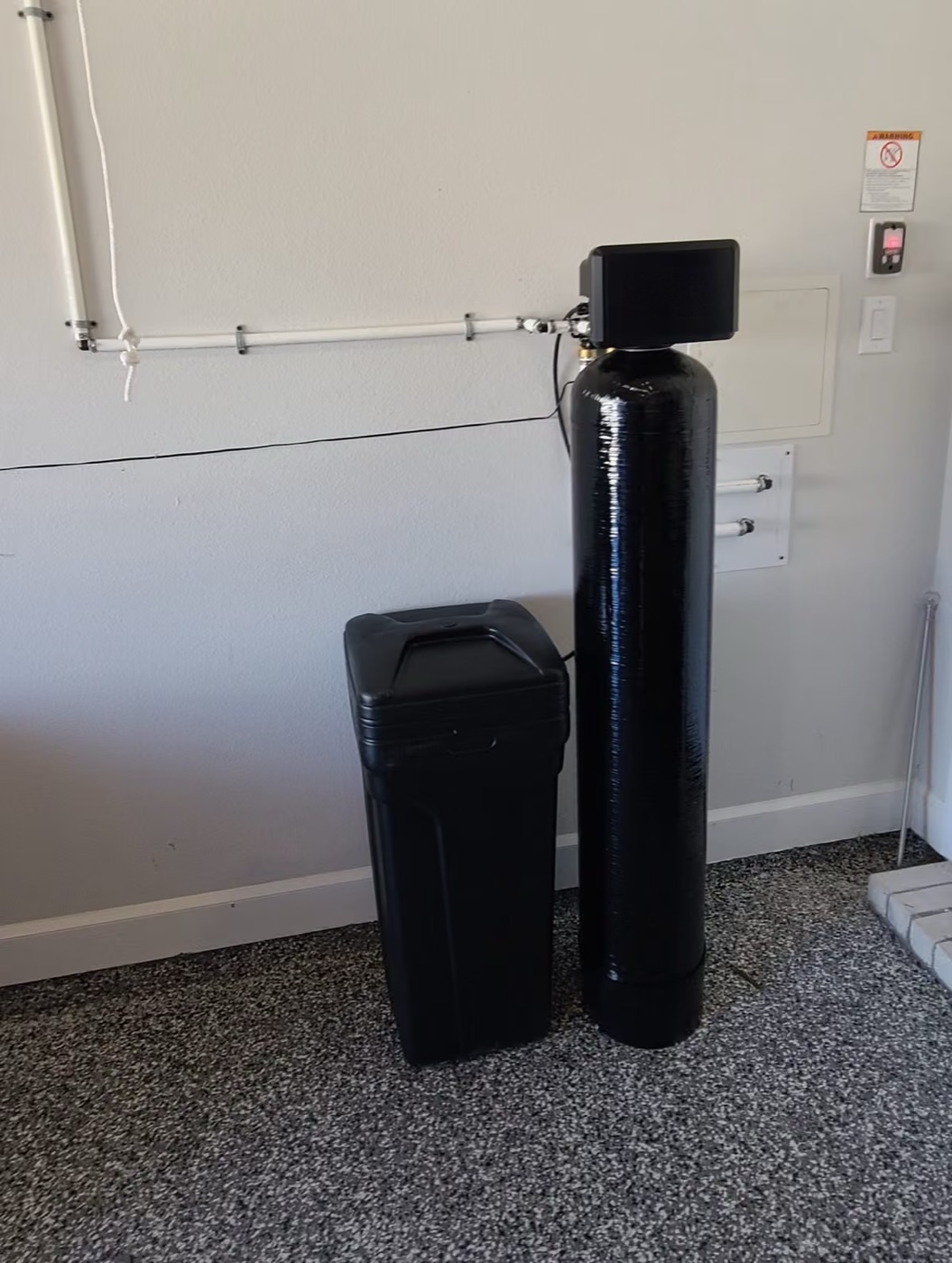 Softener and brine tank on a finished floor